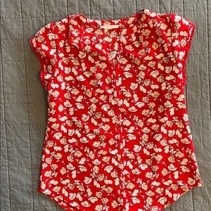 Red patterned blouse